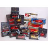 A collection of boxed diecast Ferrari ca