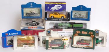 A collection of boxed diecast to include