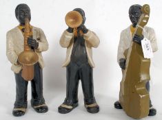 A vintage trio of ceramic black jazz musicians.