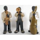 A vintage trio of ceramic black jazz musicians.