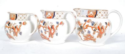 A set of 3 Imari pattern graduating jugs  of bulbous form by Stanley - Bursley Ware , all stamped to