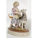 A Victorian style 20th century ceramic figure of a child and goat.