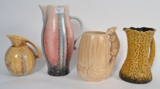 A collection of four Sylvac china vases / jugs including Squirrel etc