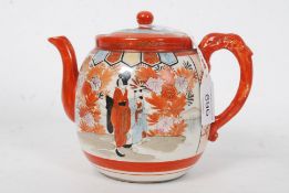 A 19th century satsuma teapot depicting geishas on a traditional oriental backdrop. 11cm tall.