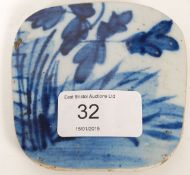 A 19th century Chinese blue and white porcelain / stoneware painted pillow rest.