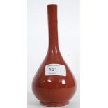 A 19th century terracotta Iznik bottle necked vase.