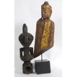 An African tribal statue pipe carving to