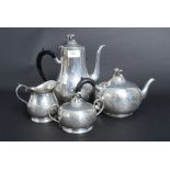 A silver plate / pewter four piece tea s