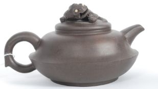 A Chinese brown porcelain Yi-Xing teapot