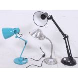 A collection of vintage anglepoise lamps