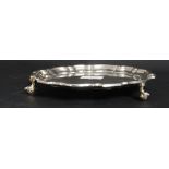 A silver hallmarked salver having scallo