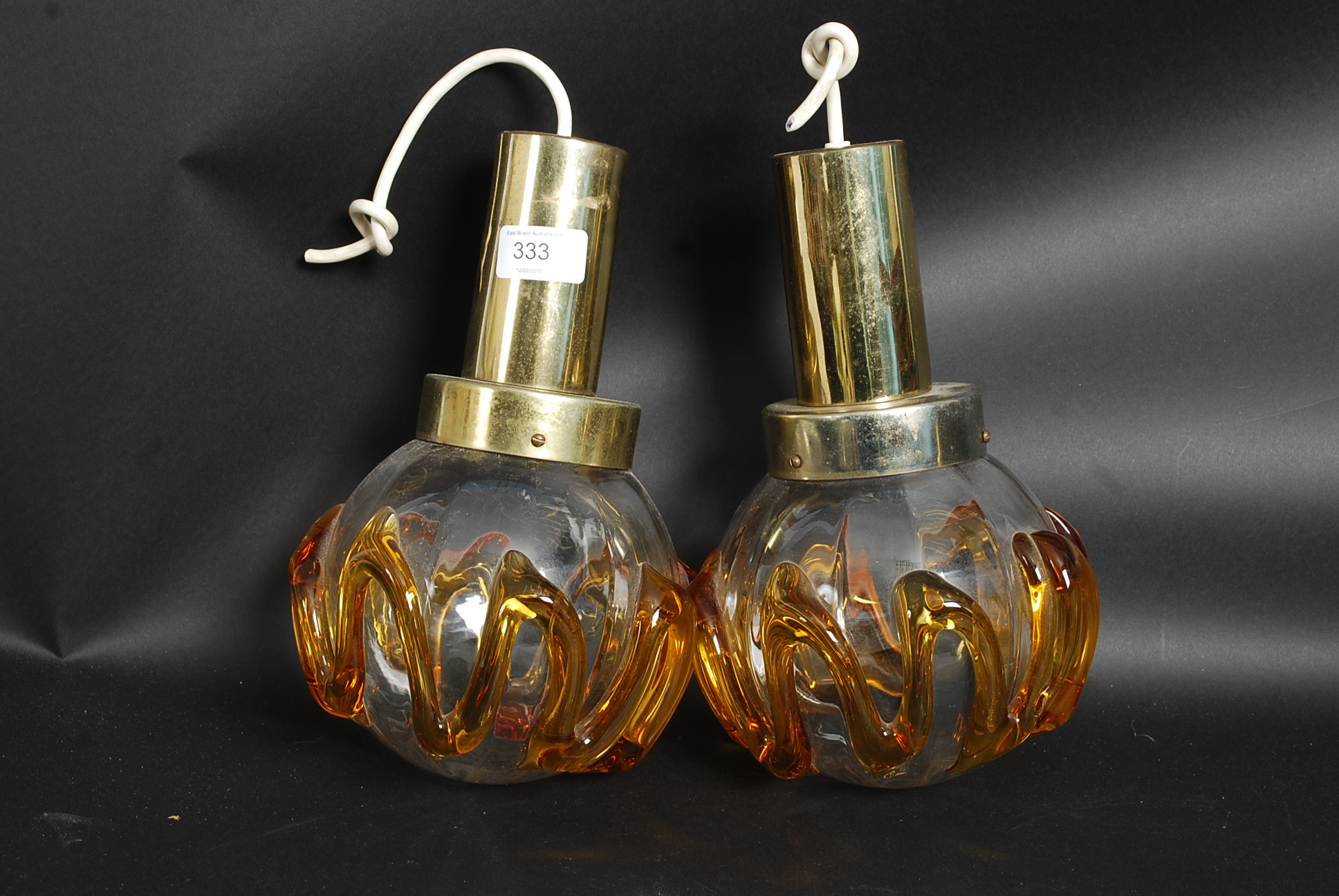 A matching pair of hanging retro lights,