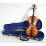 A vintage Boosey & Hawkes violin, in lat