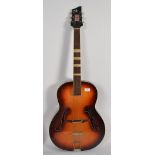 A vintage 1950's acoustic guitar with F-