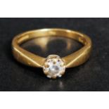 An 18k yellow gold, 25 carat single ston