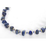 A Lapis Lazuli beaded necklace having 44