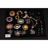 A collection of costume jewellery brooch