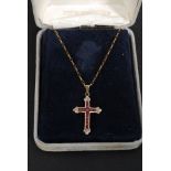 A 9ct gold crucifix necklace.