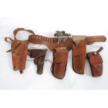 A collection of 20th century leather gun