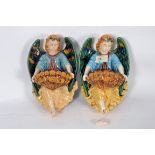 A pair of 20th century Majolica style wa