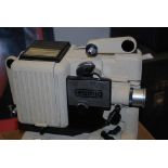 A vintage Eumig 8mm film projector with