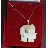 A 9ct gold and jade elephant shaped neck