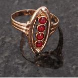 A 9ct gold and ruby red stone inset Art