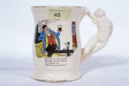 An early to mid century comic cider mug,