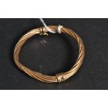 A ladies 9ct gold twist bracelet with sp