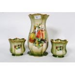 A three piece Staffordshire vase and gar