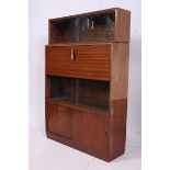 A mid 20th century lawyers mahogany stacking bookcase cabinet having sectional body with cupboards