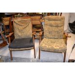 A pair of 1950's retro Parker Knoll armchairs, raised on angled supports,