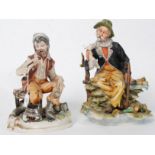 Two 20th century artist signed Capo Di Monte tramp figurines in ceramic.