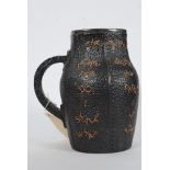 A Victorian Doulton & Slater`s Patent Stoneware Jug modelled as a leather bombard with stitched