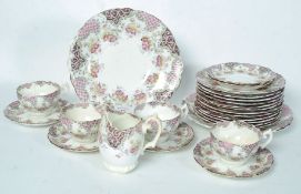 A Victorian 19th century Chintz pattern part tea service comprising cups, saucers, plates etc.