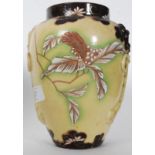 A 19th century majolica glazed vase of bulbous form with embellished decoration. Unmarked. 19.