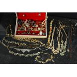 A good assortment costume jewellery to include rings, necklaces,