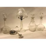 A collection of glassware to include a pair of mid-century glass drinks decanters,