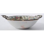 An 18th century French porcelain bowl / dish having ormulu metal embellished rim and pierced