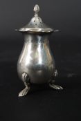 A silver hallmarked pepper pot by  S. Bl