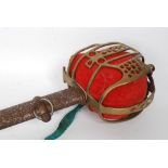 A 19th century officers cavalry sword complete with the metal scabbard having pierced decorative