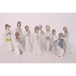 LLADRO NAO; A collection of 10x assorted Lladro Nao figurines of children, in various designs.