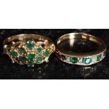 Two 9ct gold rings, one being diamond and emerald along with another.