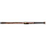An unusual walking stick with cast metal tapered point being inscribed to the top,