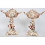 A pair of continental porcelain Italian centrepieces.