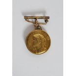 A open faced yellow metal untested gold fob watch incorporating a Swiss gold coin.