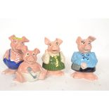 A collection of 4x Wade china Natwest piggy bank money box pigs.