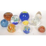 A collection of 10x studio glass 20th century paperweights.