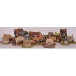 A collection of 15x loose Lilliput Lane model cottages.