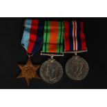 A World War Two / medal group trio ( Defence Medal, 1939-1945 Medal & 1939-1945 Star) .